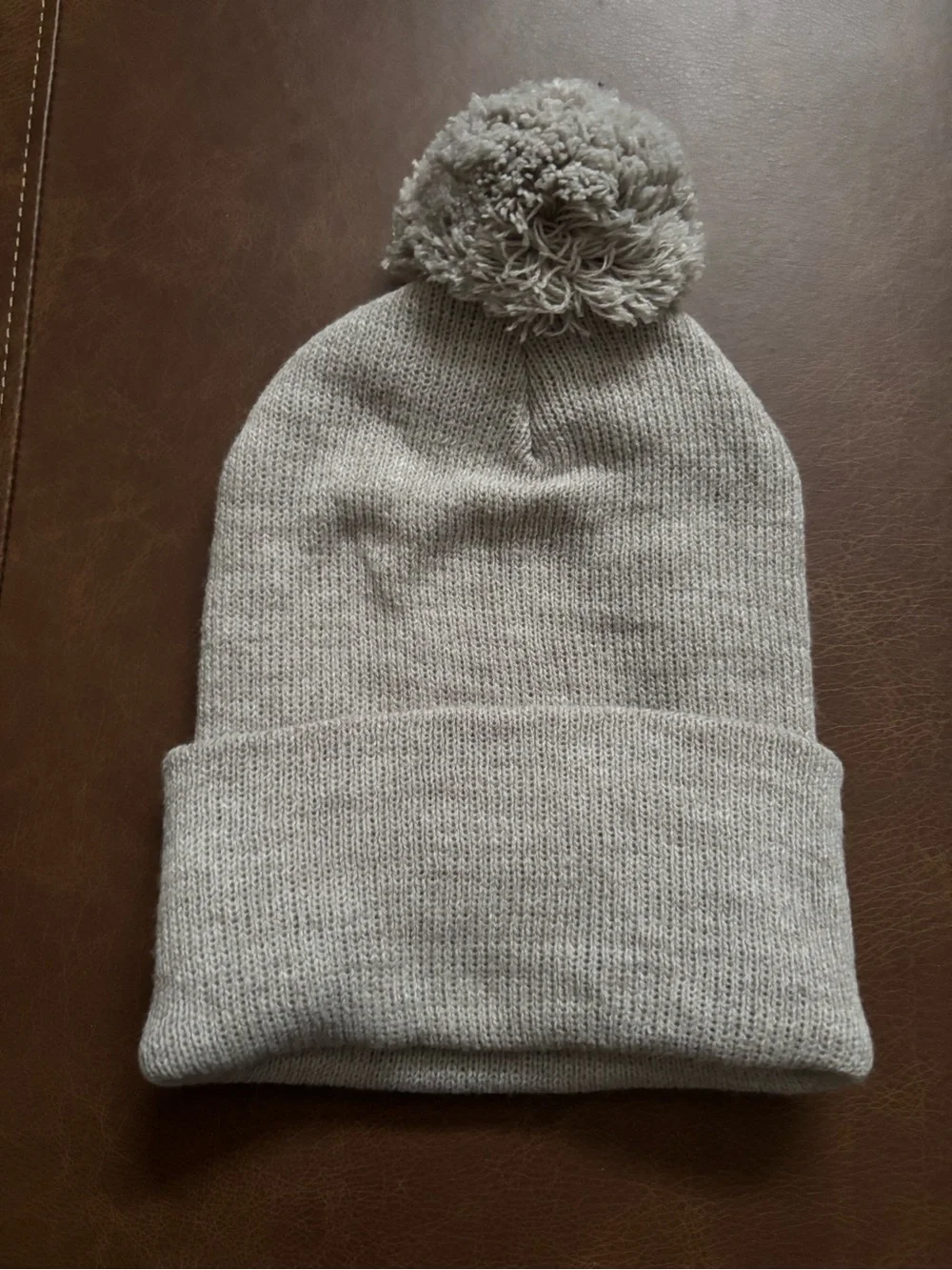 Carhartt Pom Beanie Hat in Light Gray with Orange Logo